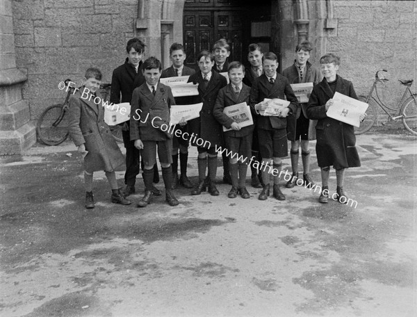 BOYS WITH STANDARD NEWSPAPER